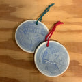 Ceramic ornaments embossed with round Holden Mountain logo